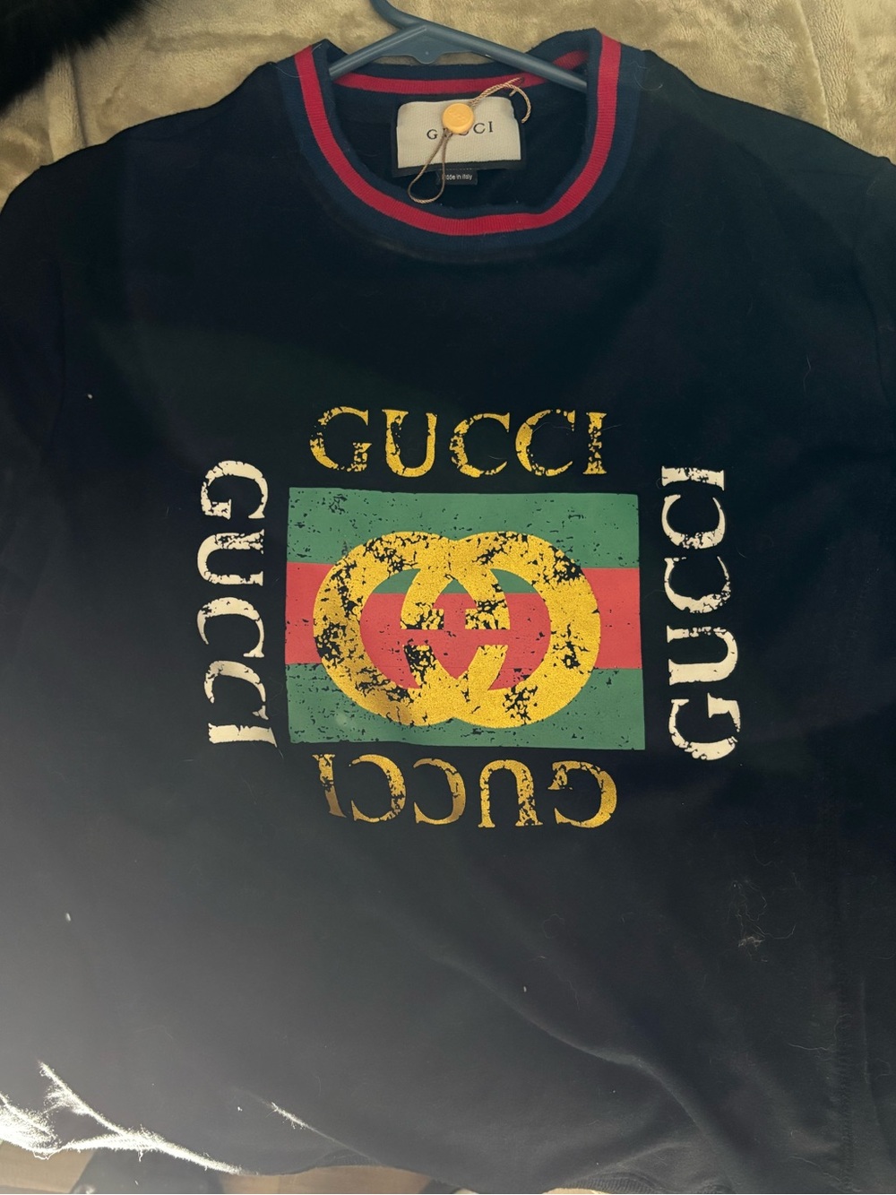 Black Sweater with Red, Green and Yellow Logo